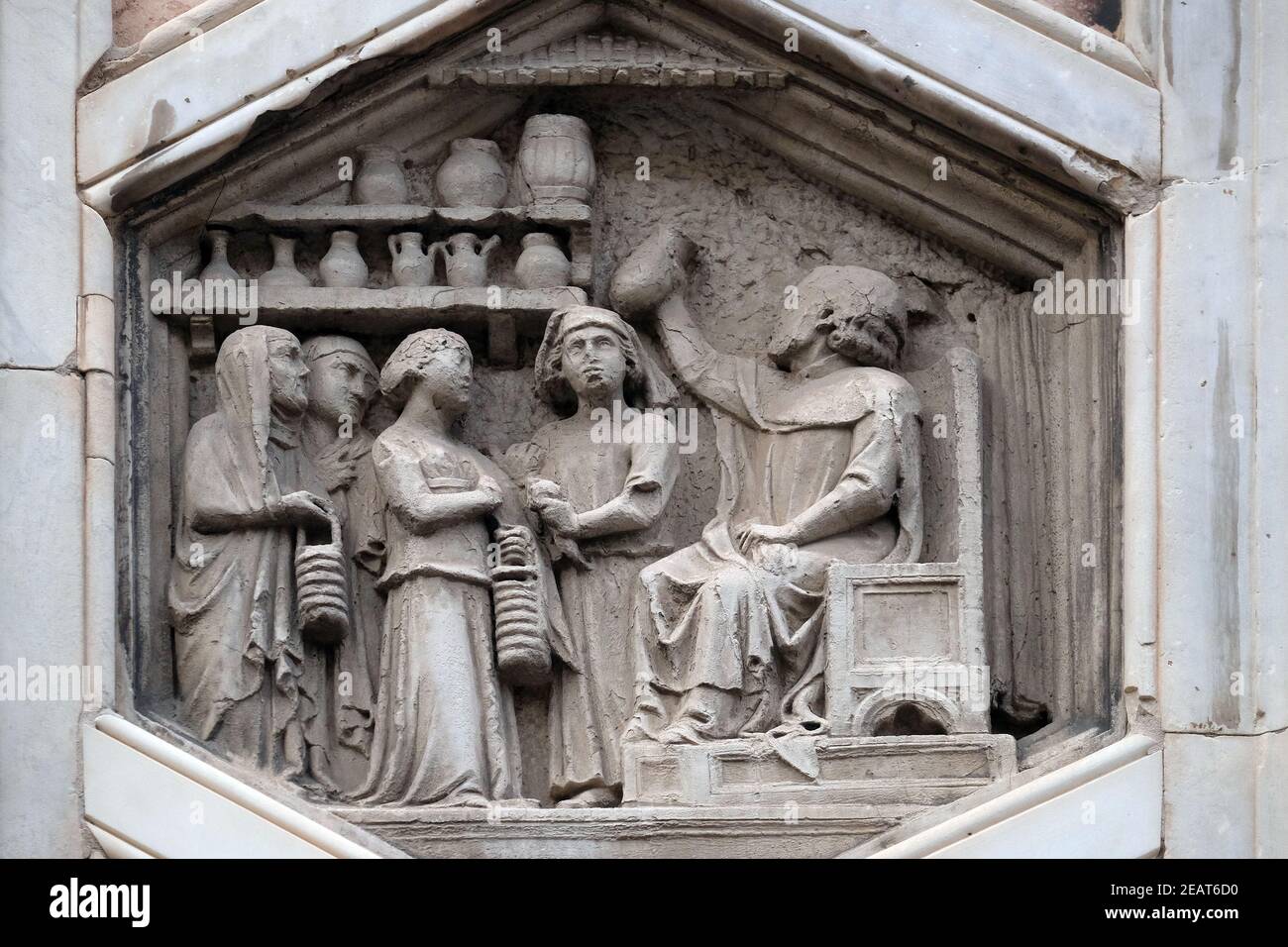 Allegory of medicine from the workshop of Andrea Pisano, Relief on Giotto Campanile of Cattedrale di Santa Maria del Fiore (Cathedral of Saint Mary of the Flower), Florence, Italy Stock Photo