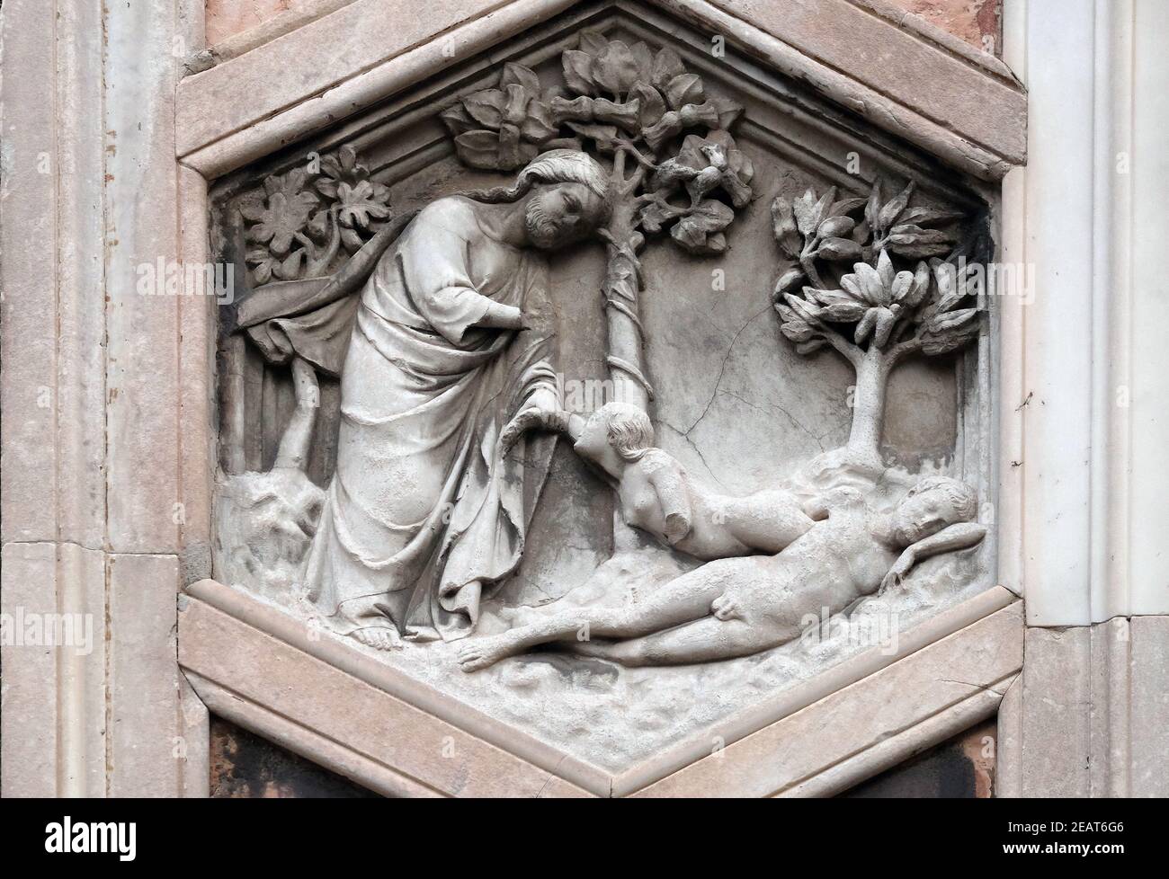 Creation of Eve by Andrea Pisano, 1334-36., Relief on Giotto Campanile of Cattedrale di Santa Maria del Fiore (Cathedral of Saint Mary of the Flower), Florence, Italy Stock Photo