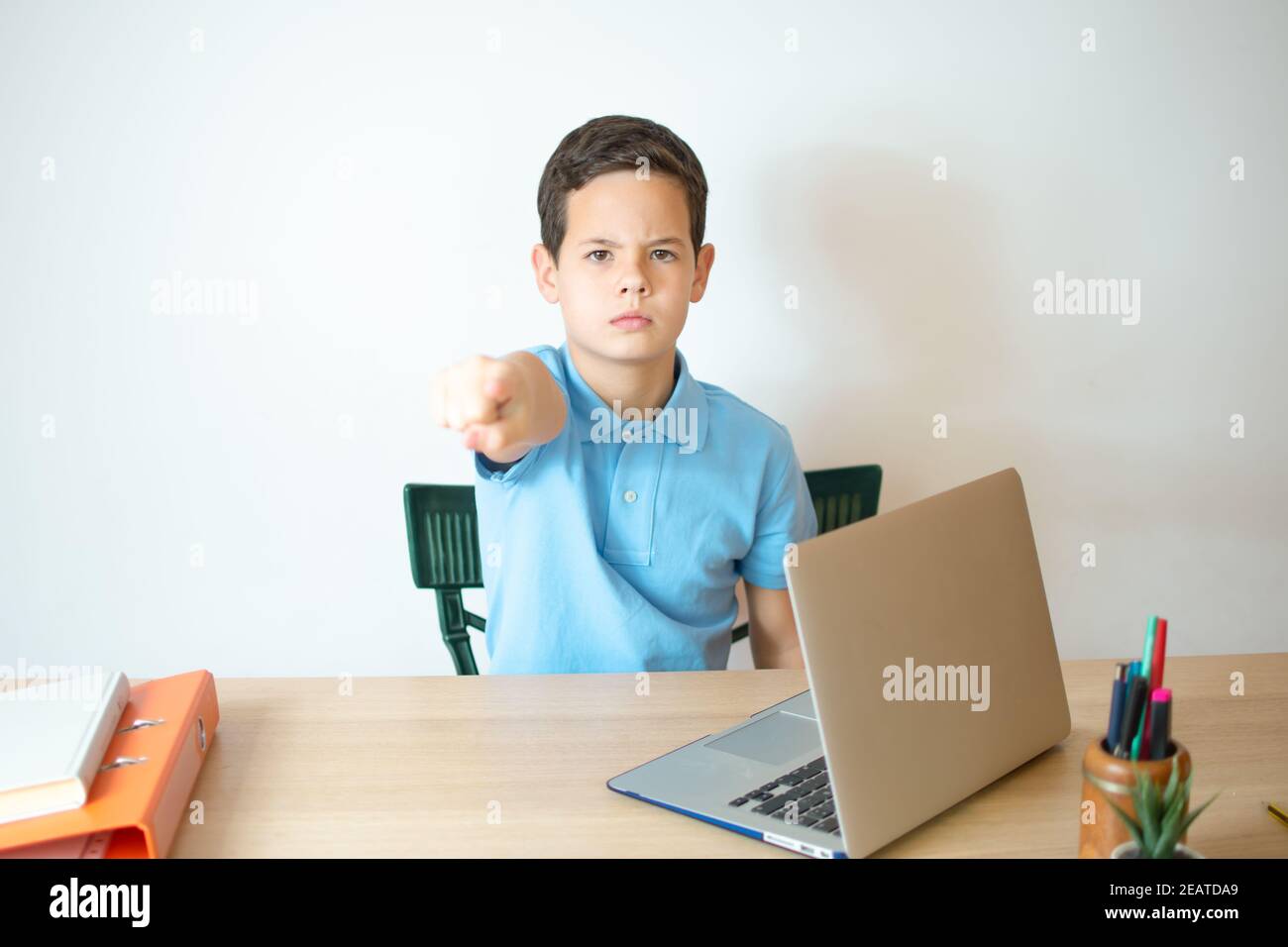 Computer Hand Boy Young boy studying using computer laptop with open hand doing stop sign ...