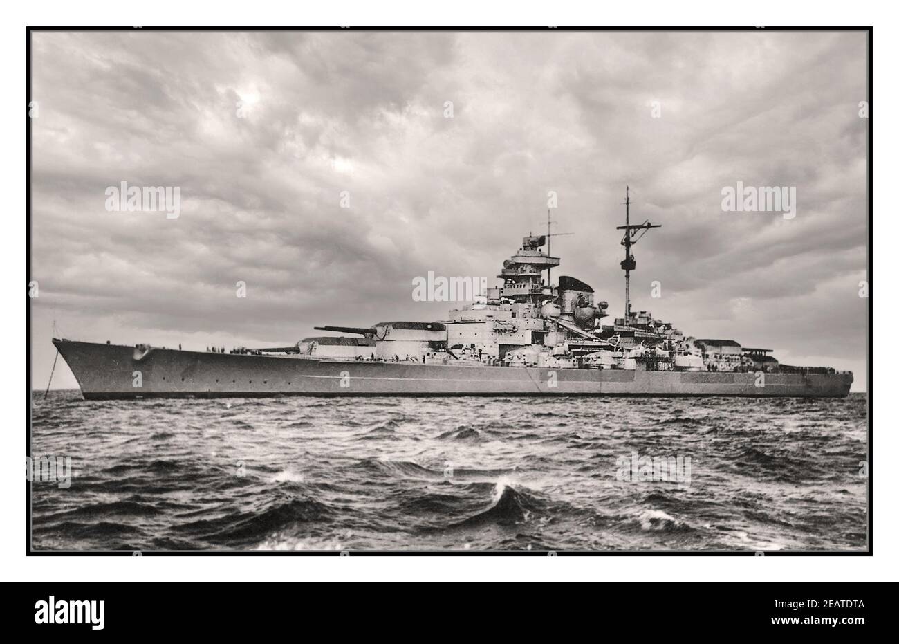 Tirpitz Battleship WW2 Nazi Germany Kriegsmarine the second of two Bismarck-class battleships built for Nazi Germany's Kriegsmarine (navy) prior to and during the Second World War. Named after Grand Admiral Alfred von Tirpitz, the architect of the Kaiserliche Marine (Imperial Navy), the ship was laid down at the Kriegsmarinewerft Wilhelmshaven in November 1936 and her hull was launched two and a half years later. Work was completed in February 1941, when she was commissioned into the German fleet. Sunk by Royal Air Force Lancaster bombers on 12th November 1944 Stock Photo