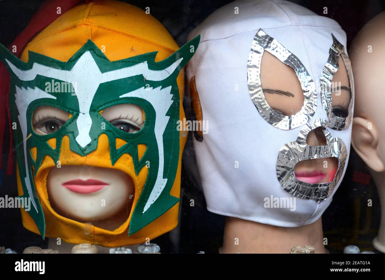 Souvenir Mexican lucha libre masks, similar to those worn by professional wrestlers, for sale in a shop in San Antonio, Texas. Stock Photo