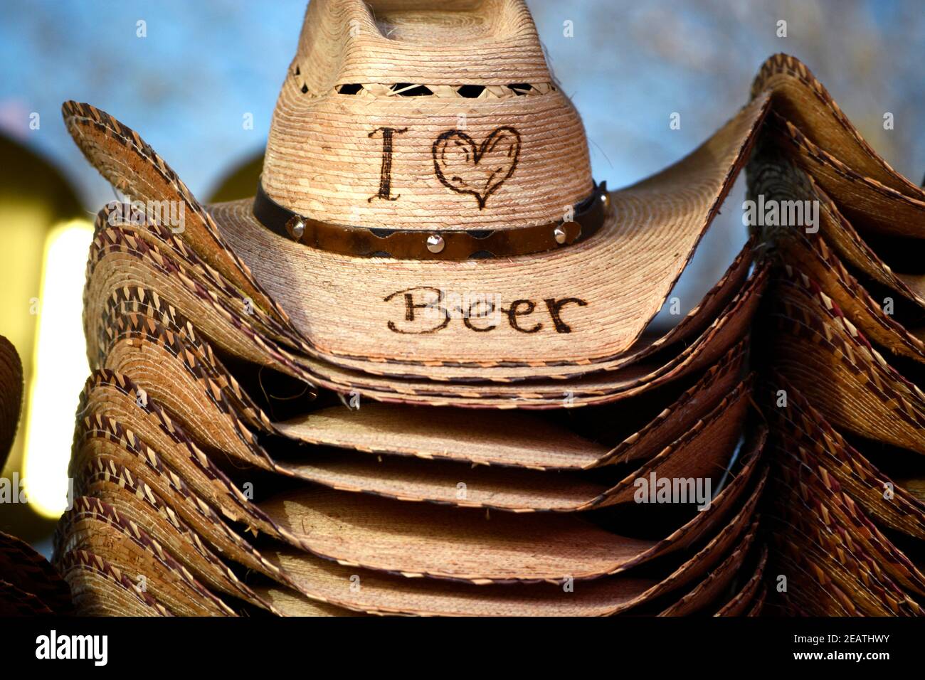 Souvenir straw cowboy hats for beer lovers for sale in San Antonio, Texas  Stock Photo - Alamy