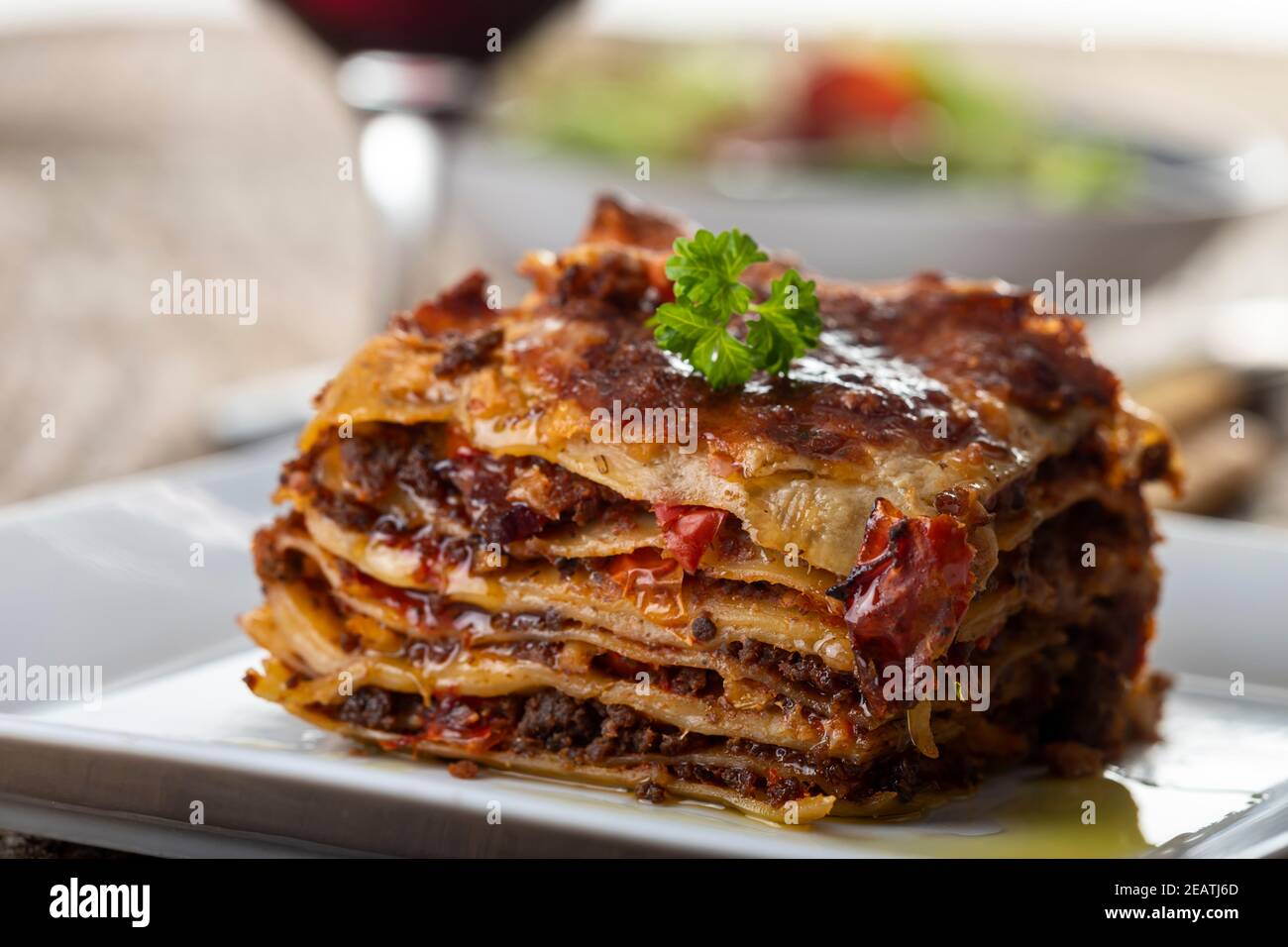 portion of lasagna on a plate Stock Photo