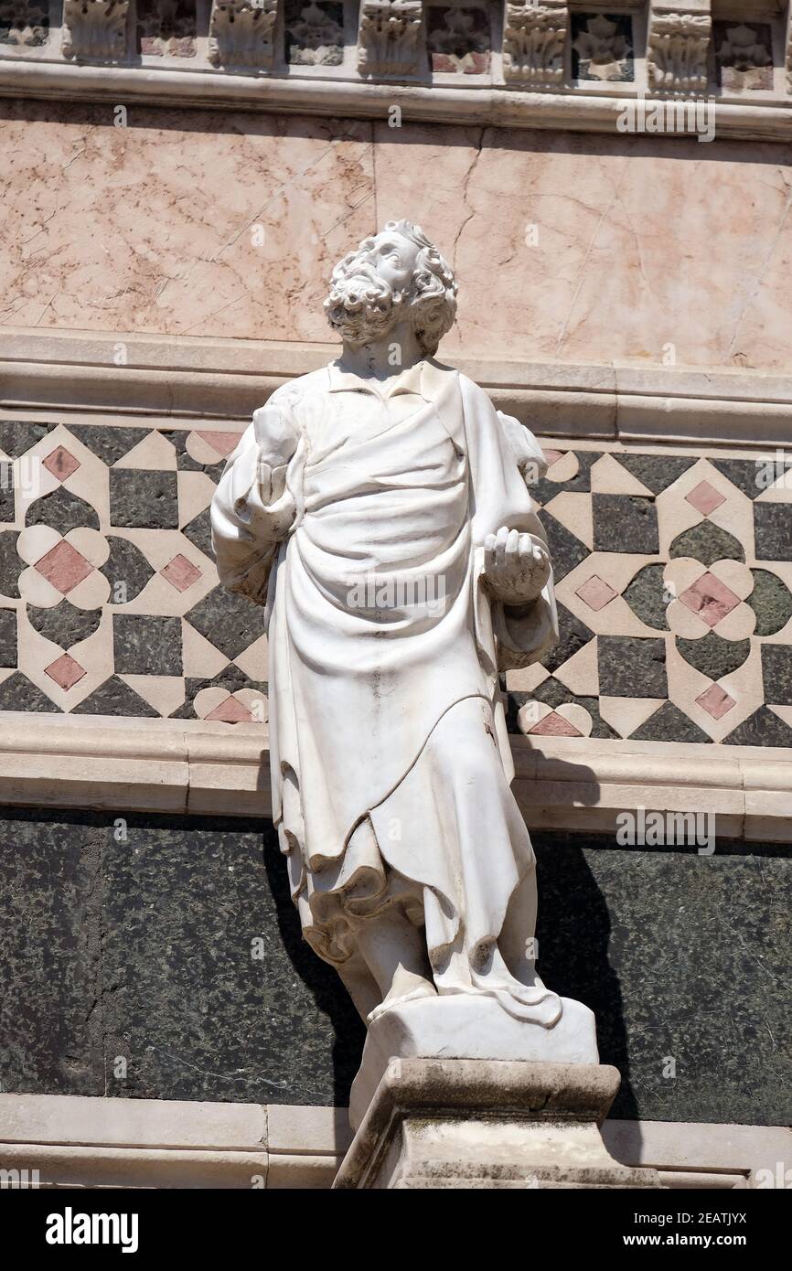 Statue of Prophet attributed to Andrea Pisano, Portal on the side-wall of Cattedrale di Santa Maria del Fiore (Cathedral of Saint Mary of the Flower), Florence, Italy Stock Photo
