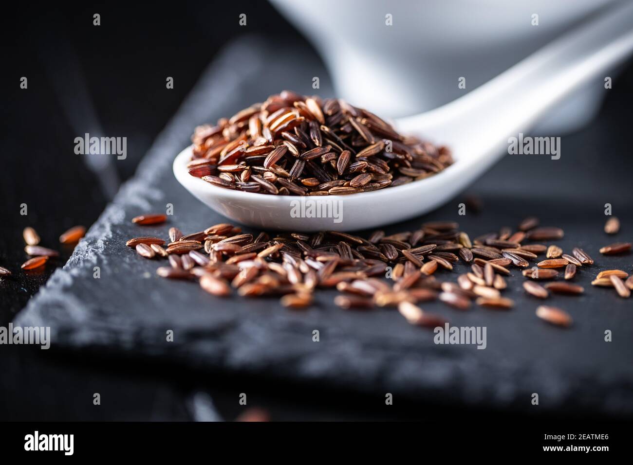 Uncooked red rice. Raw wild rice Stock Photo Alamy