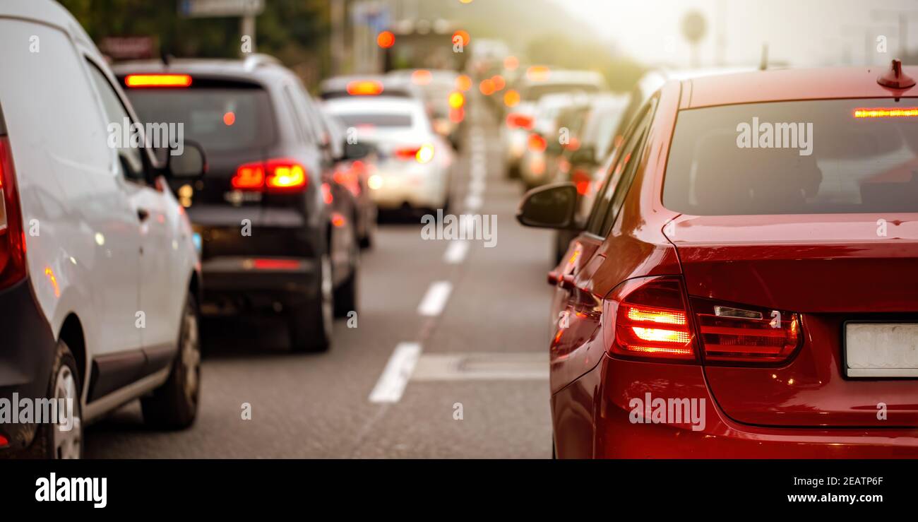 Rear view of modern car with brake lights on during rush hour Stock ...