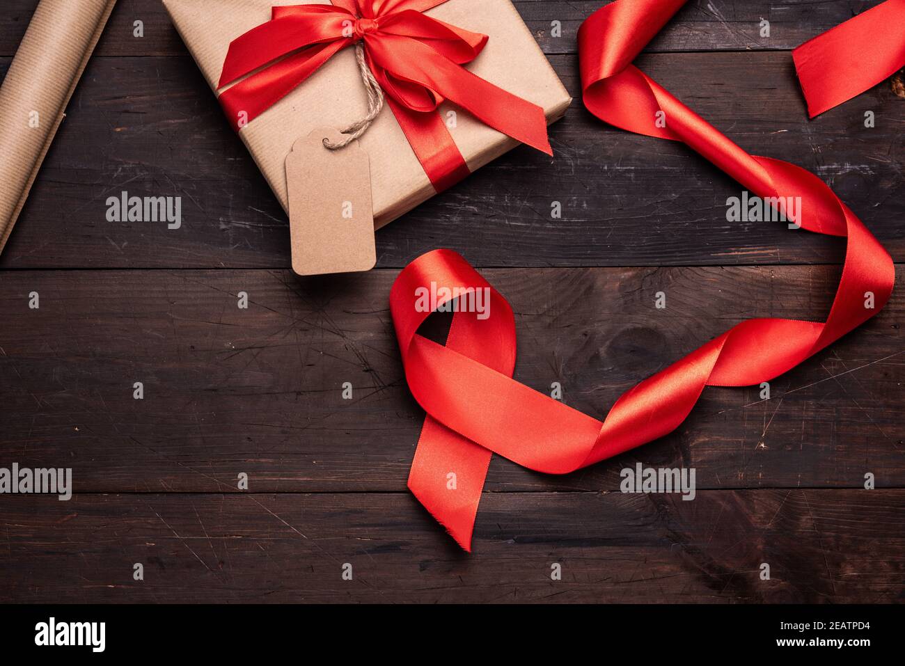 Red ribbon packaging hi-res stock photography and images - Alamy