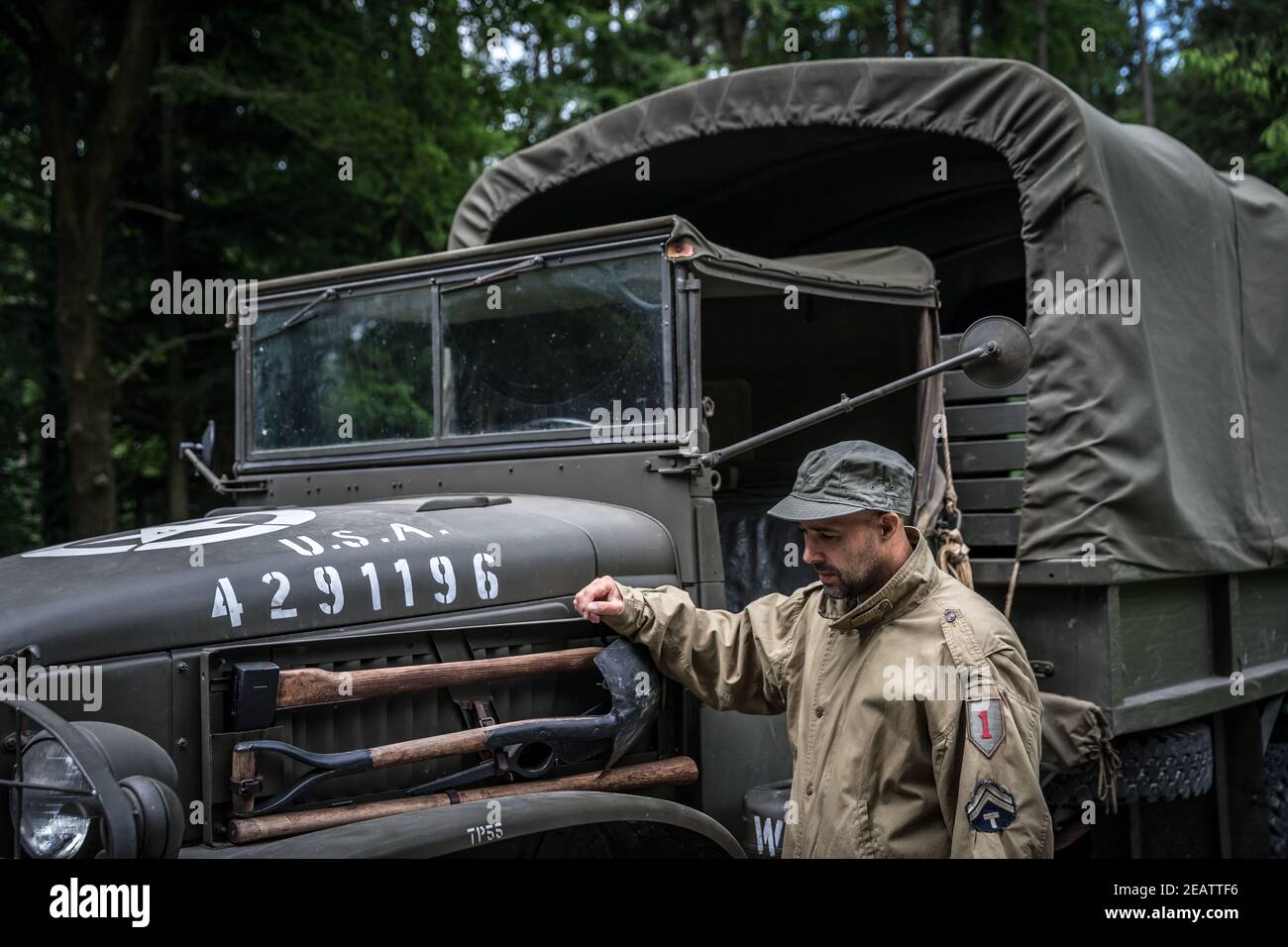 man in a military uniform in an army car Stock Photo