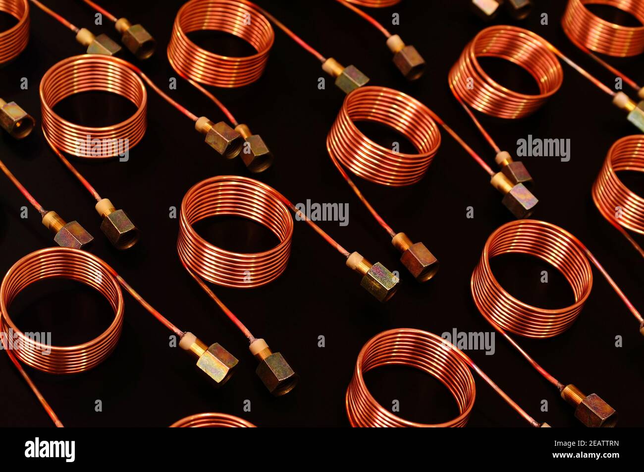 Serpentine copper tube coils for many industries Stock Photo Alamy