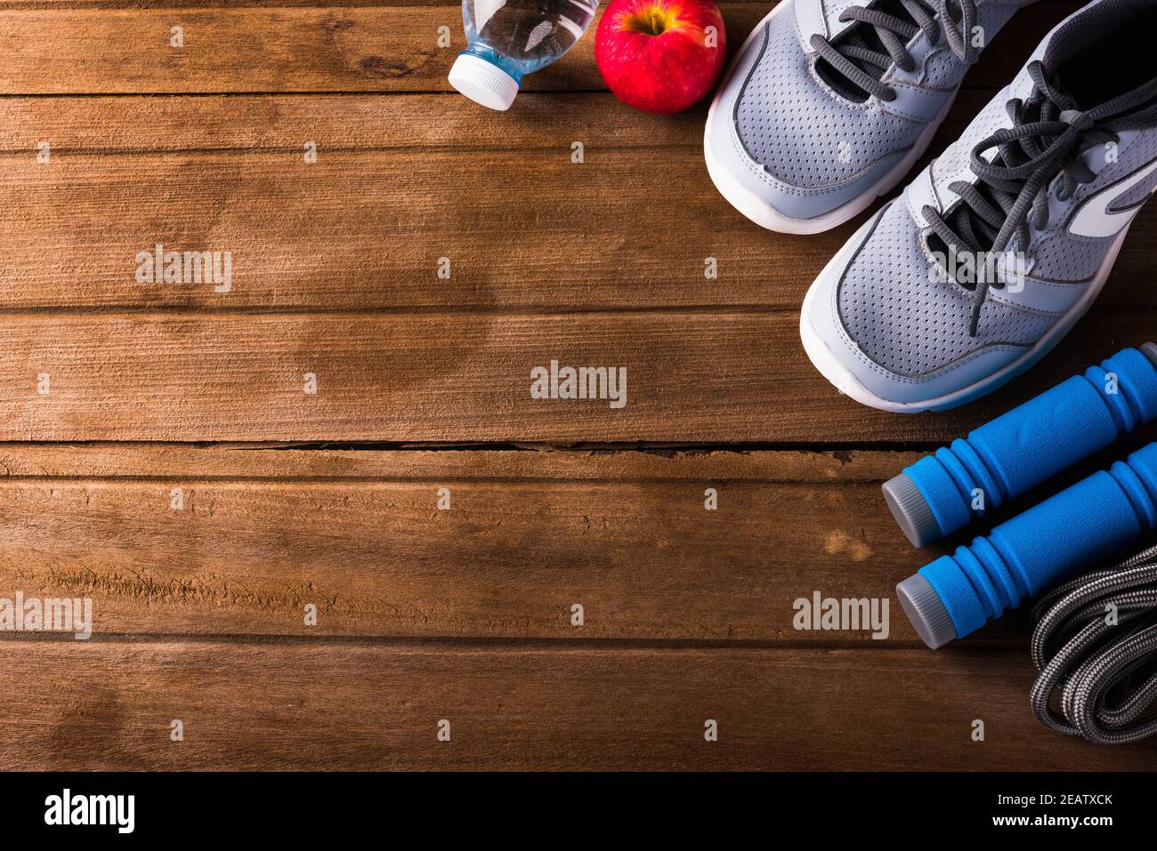 Premium Photo  Blue jump rope and sneakers on the wooden floor