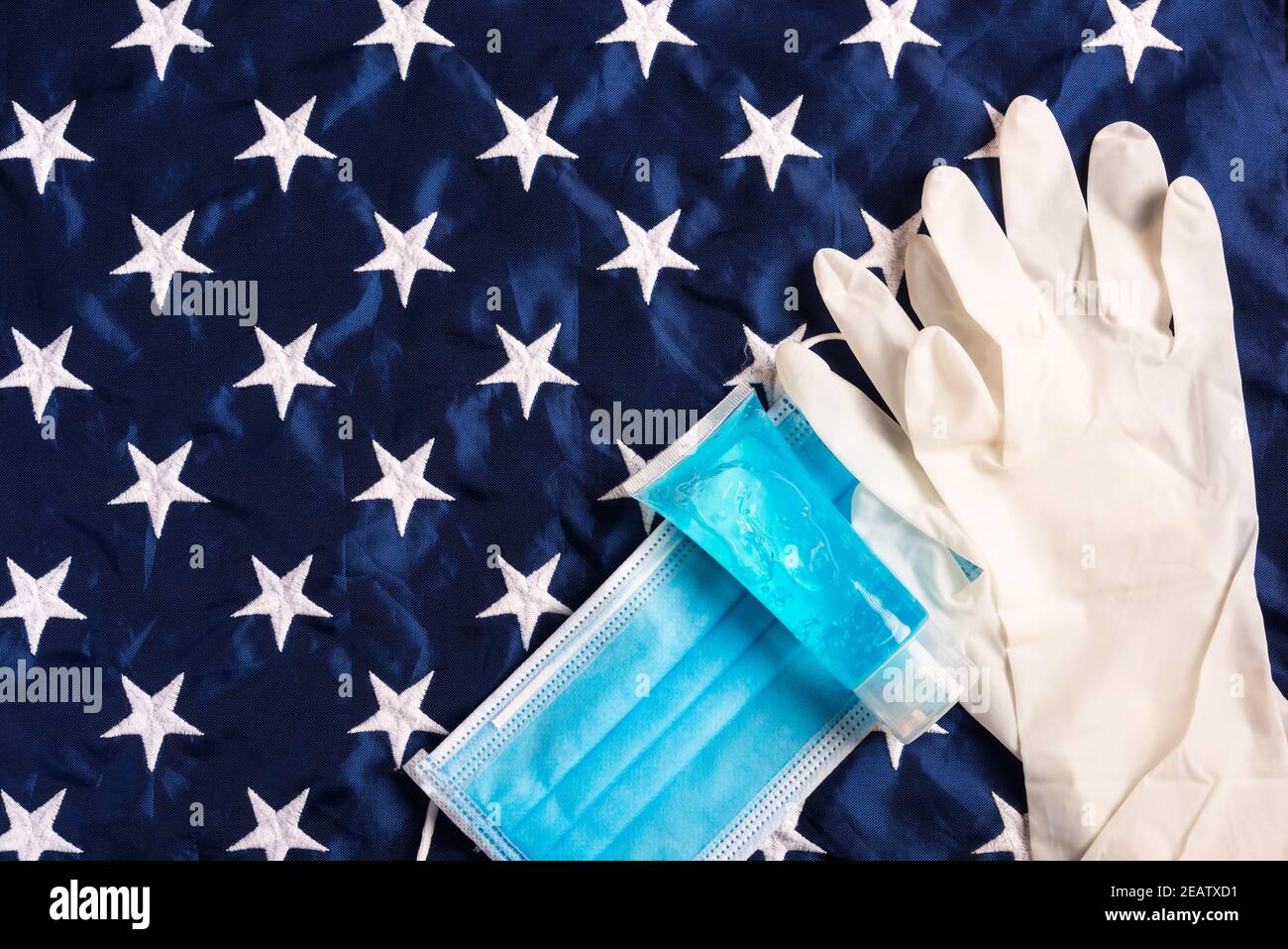Medical protective disposable face mask for cover mouth on blue America star flag Stock Photo