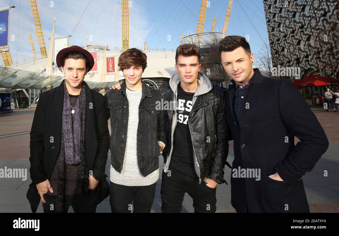 (left to right) JJ Hamblett, George Shelley, Josh Cuthbert and Jaymi Hensley from Union J busking outside the O2 in Greenwich, south London. Picture date: Wednesday October 22, 2014. Stock Photo