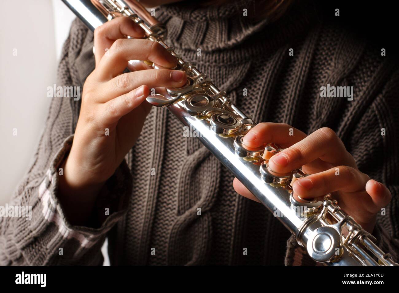 Girl playing flute Stock Photo Alamy