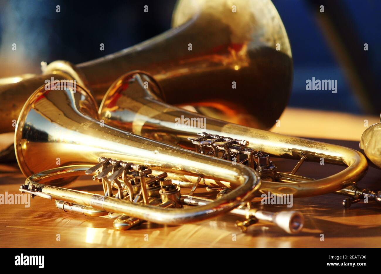 Blowing brass wind instrument on table Stock Photo