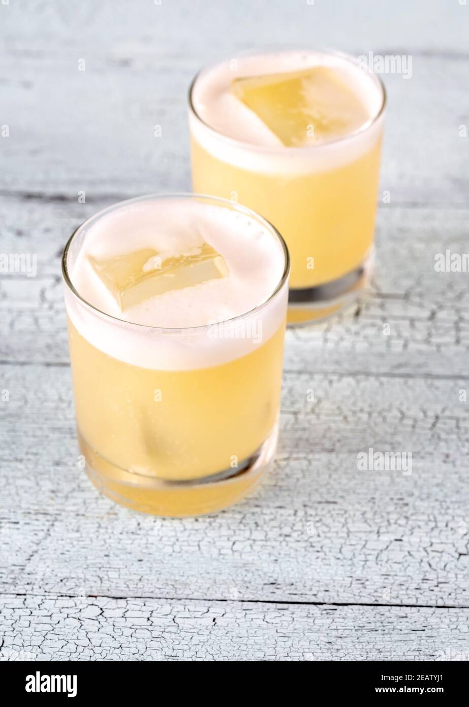 Glasses of whiskey sour Stock Photo Alamy