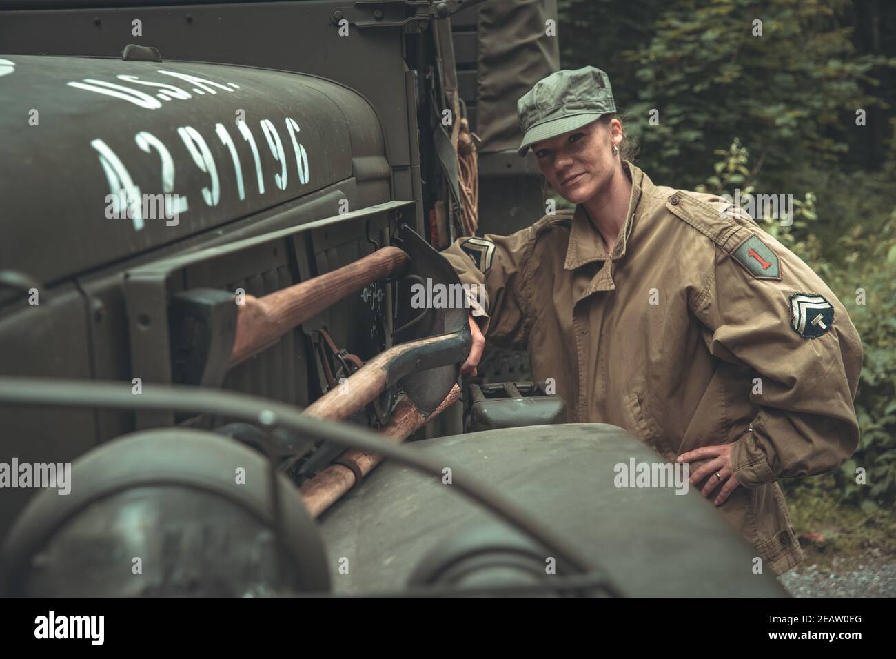 woman in a military uniform in an army car Stock Photo