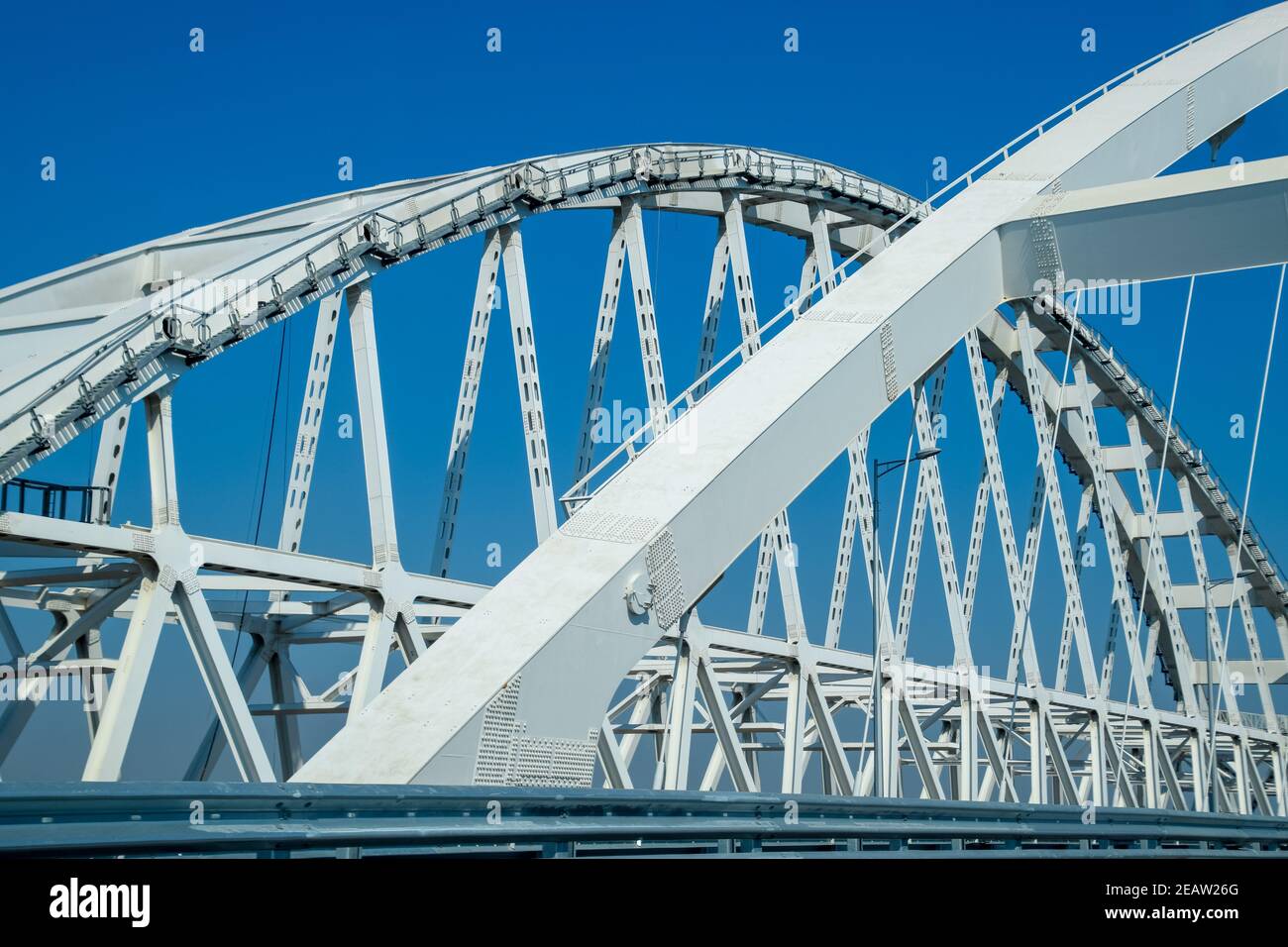 The navigable arch of the Crimean bridge. Arch of the highway and railway section of the Crimean bridge. Stock Photo