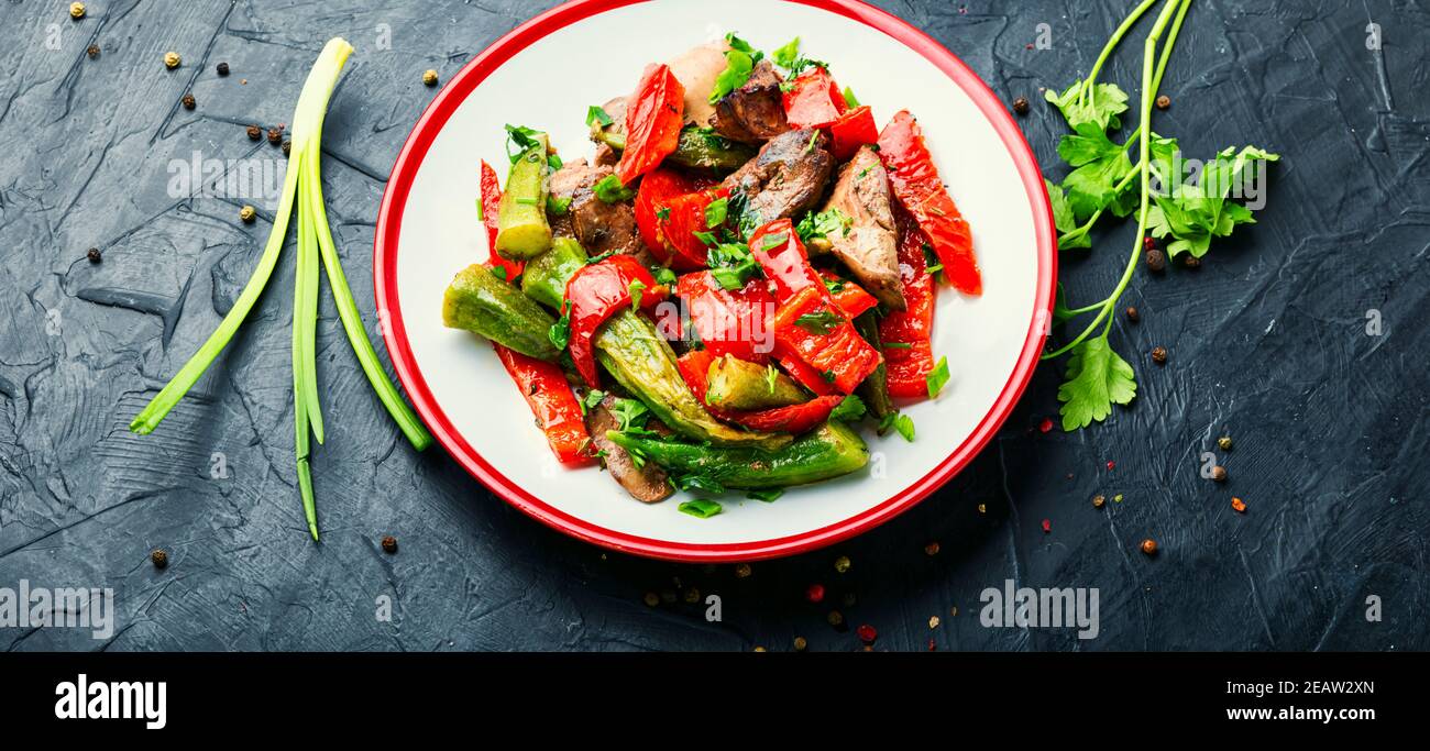 Vegetable and liver salad. Stock Photo