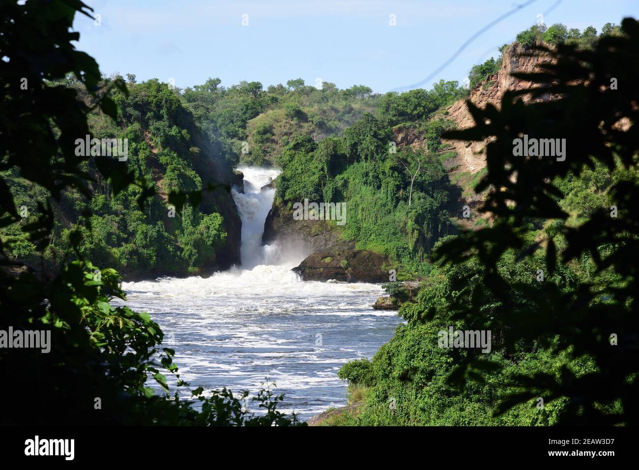 Waterfall in beautiful green forest with white water, rocks, roaring water, Murchison Falls National Park Uganda Stock Photo