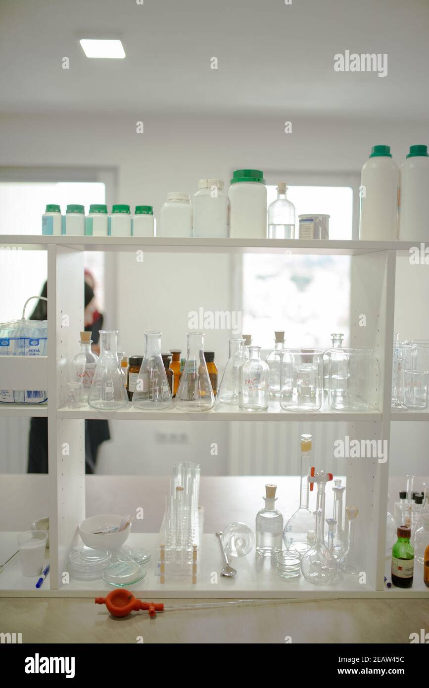Test tubes in a laboratory on shelves Stock Photo Alamy