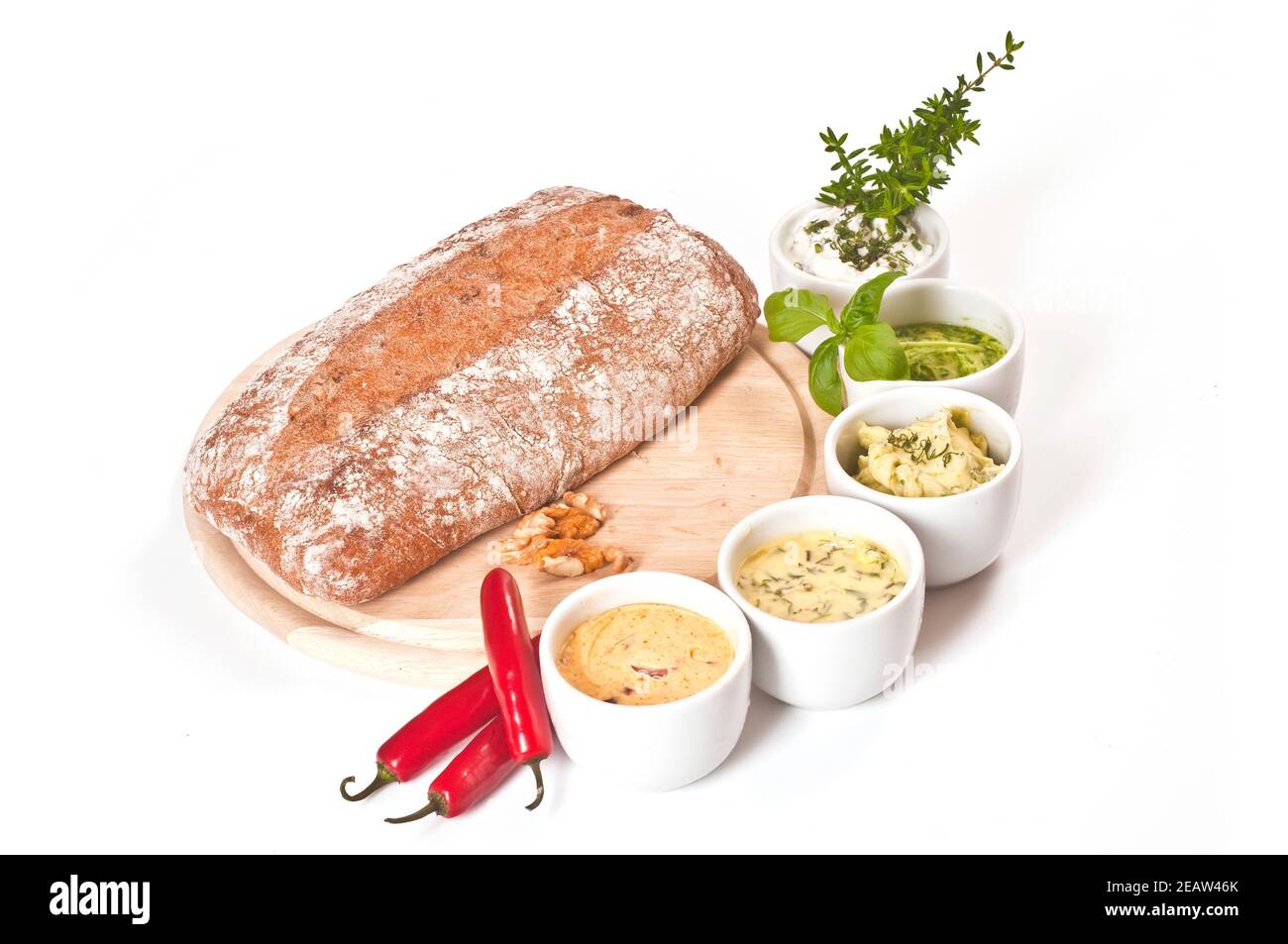 Frisches Brot mit KrÃ¤uterbutter und KrÃ¤uterquark Stock Photo