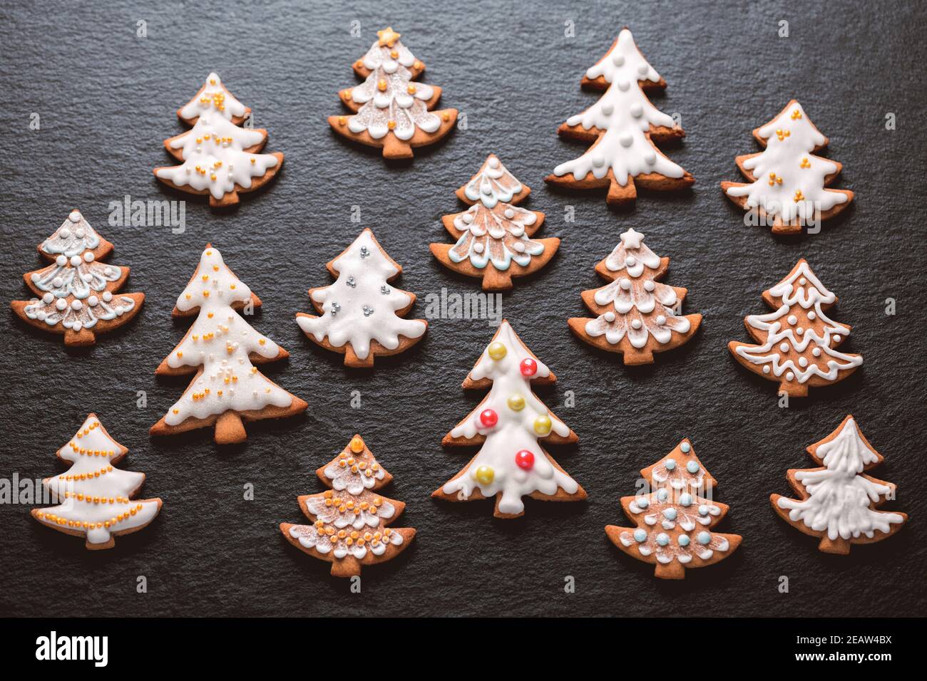 Homemade christmas cookies on slate table Stock Photo