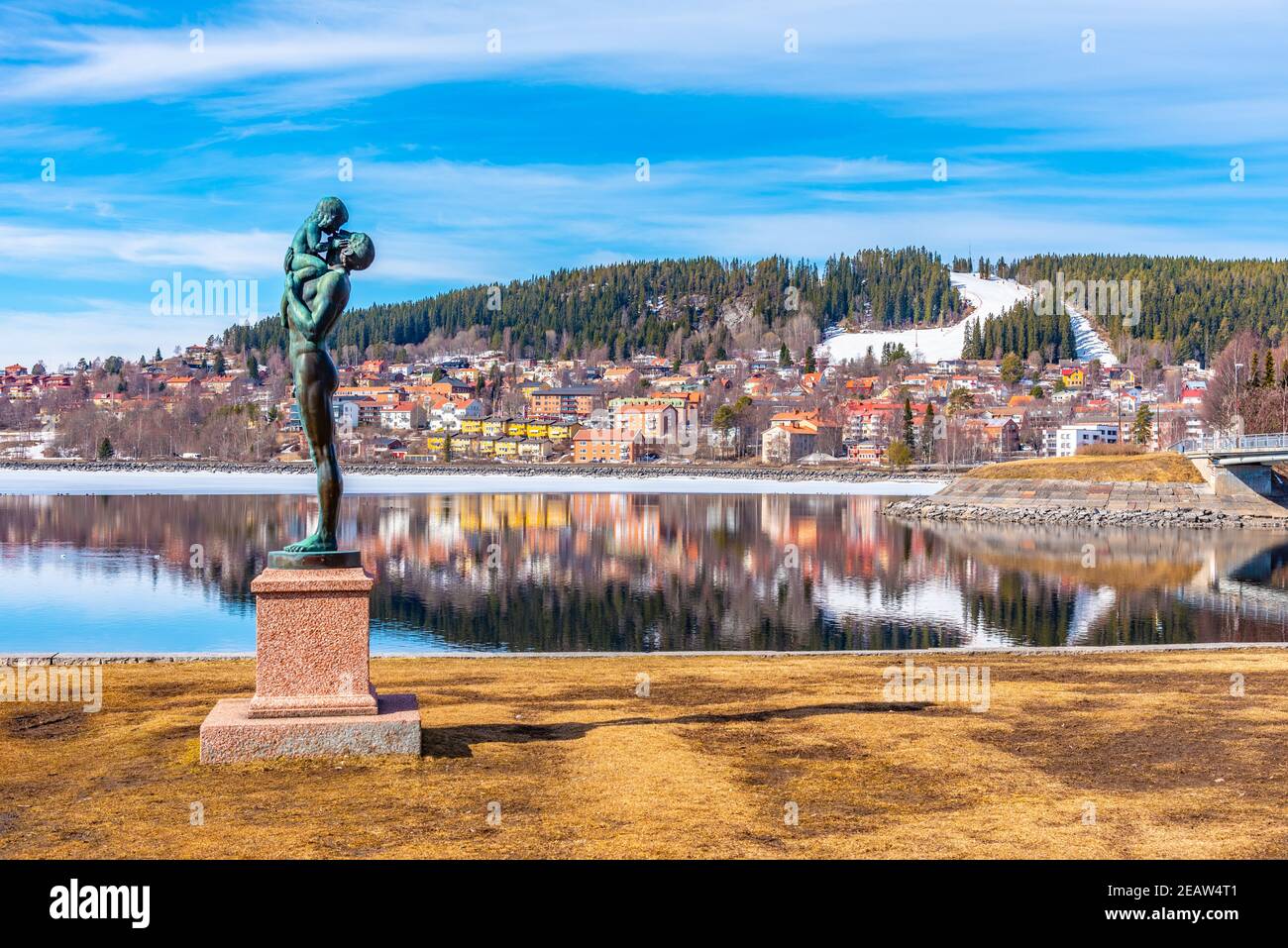 Skyline of Ostersund with a statue of father and a kid in Sweden Stock