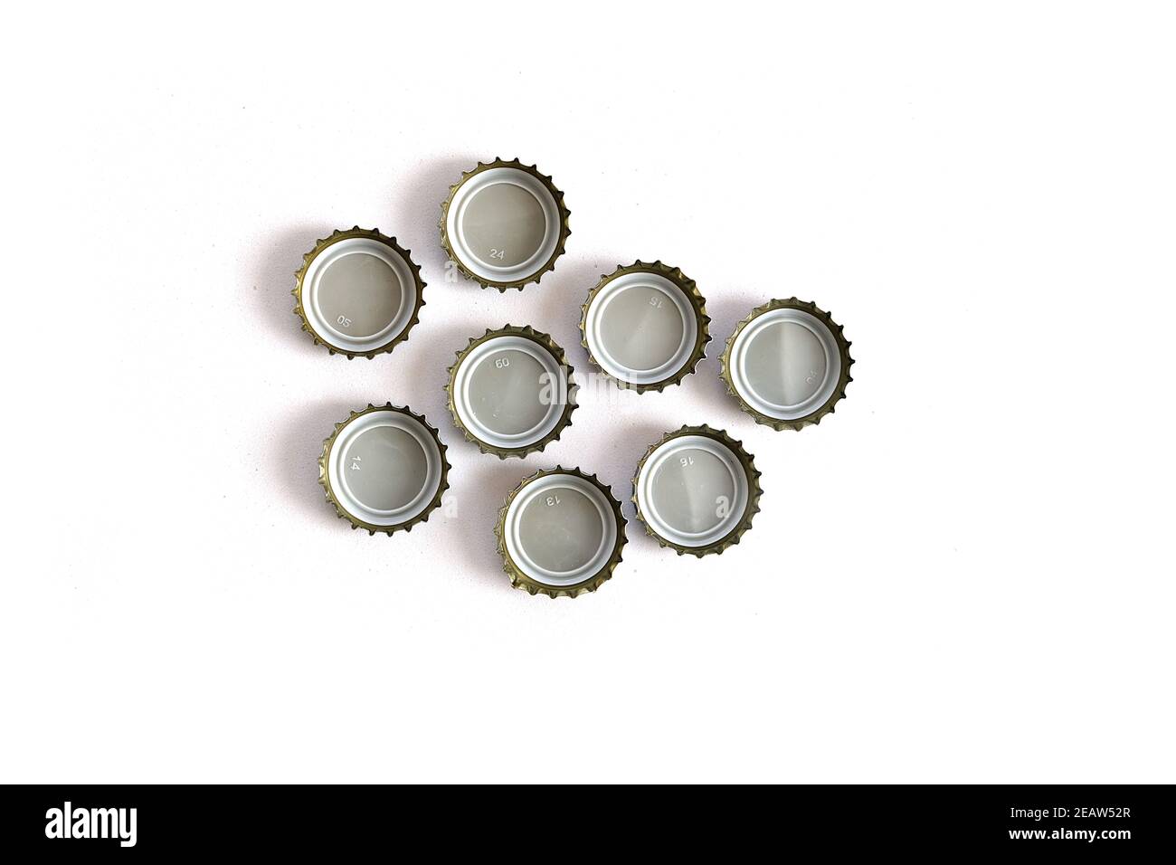 metal soda bottle caps, soda caps, closeup on white background Stock