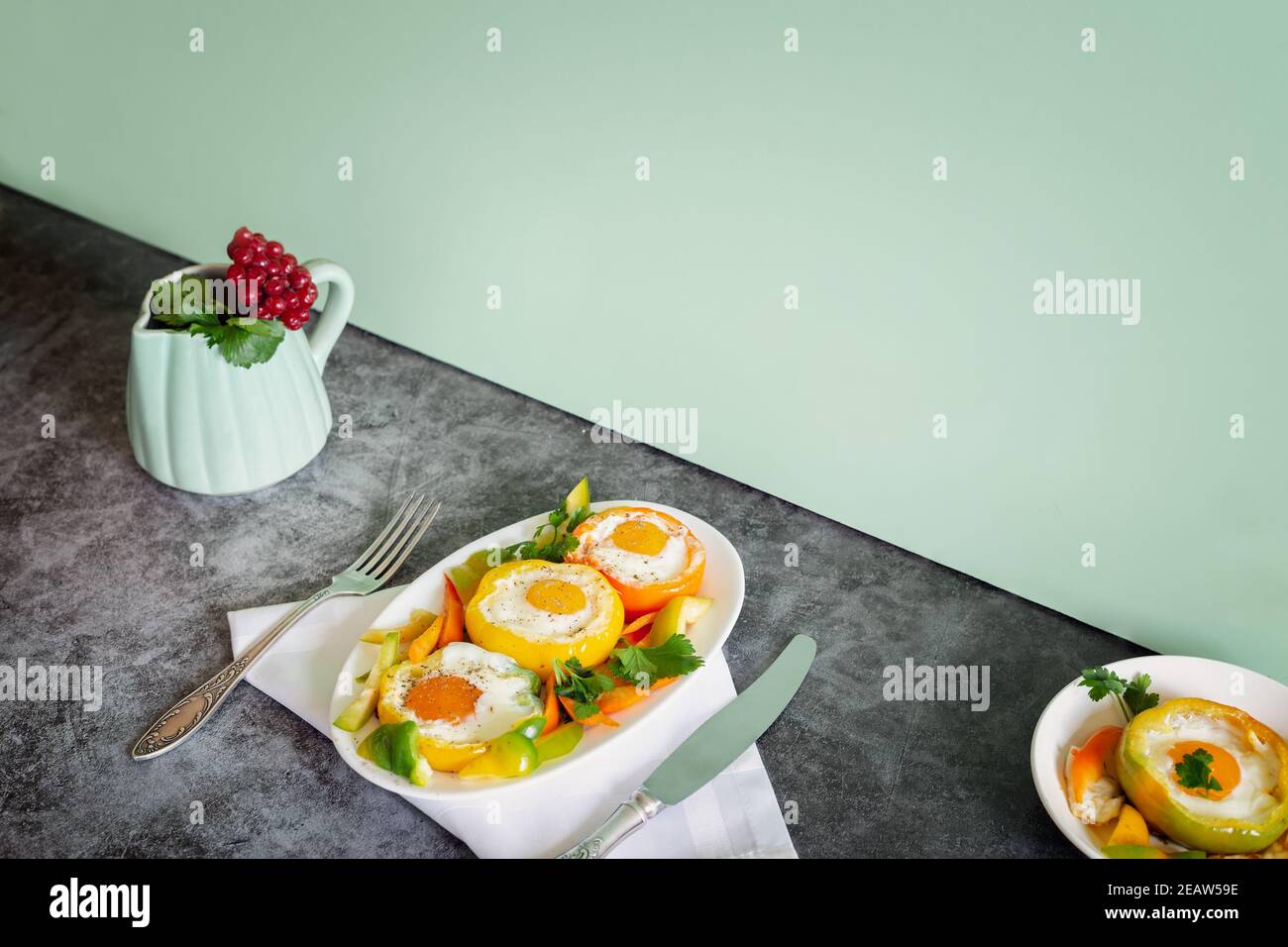 Baked bell pepper with egg inside the pepper Stock Photo Alamy