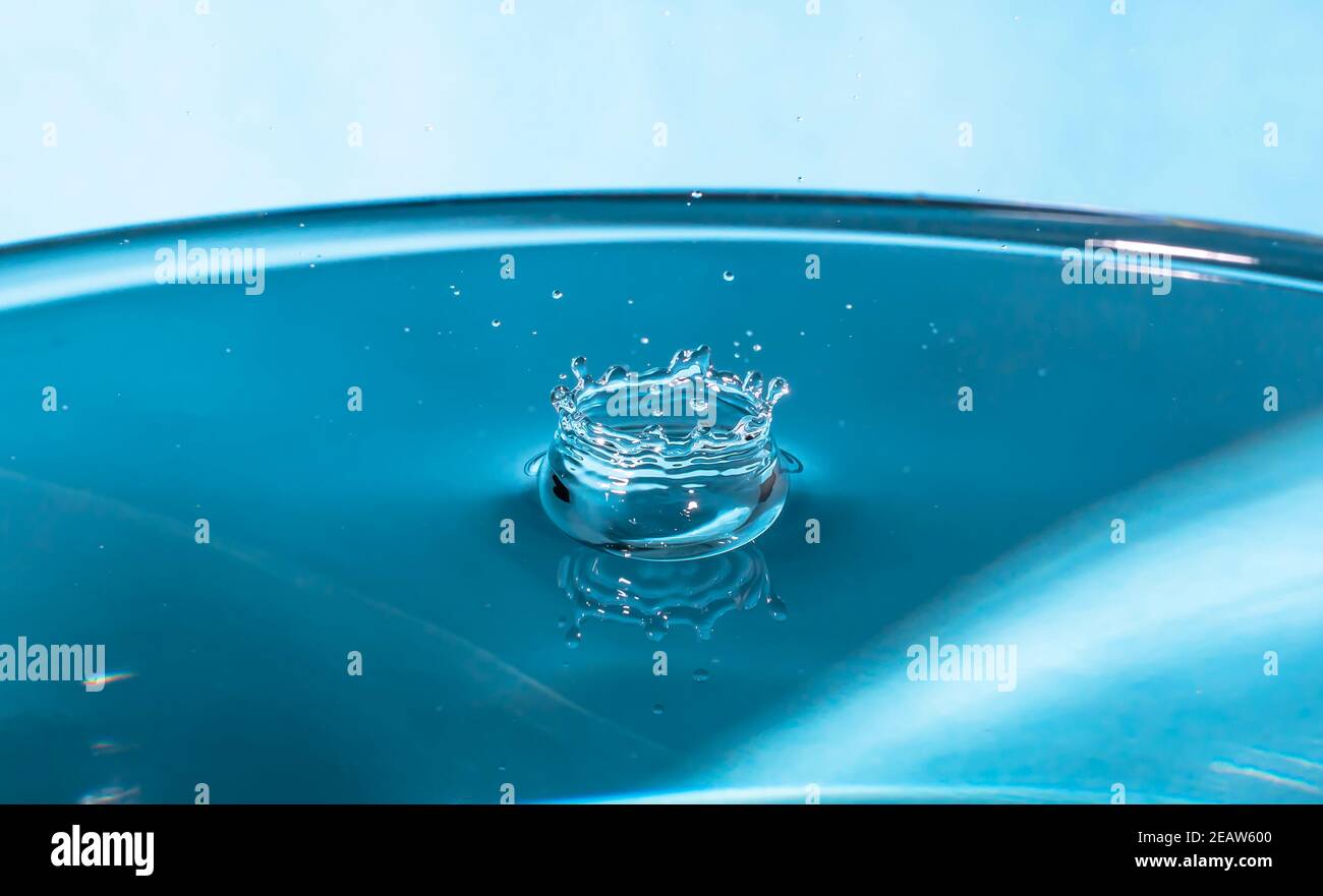 Small and big ice cube with water drops Stock Photo - Alamy