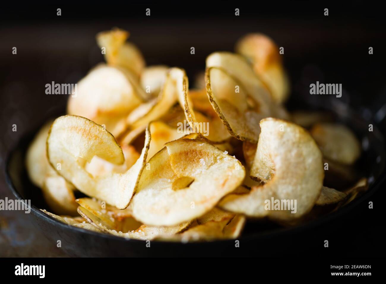 rustic english pub grub ribbon cut potato crisps Stock Photo