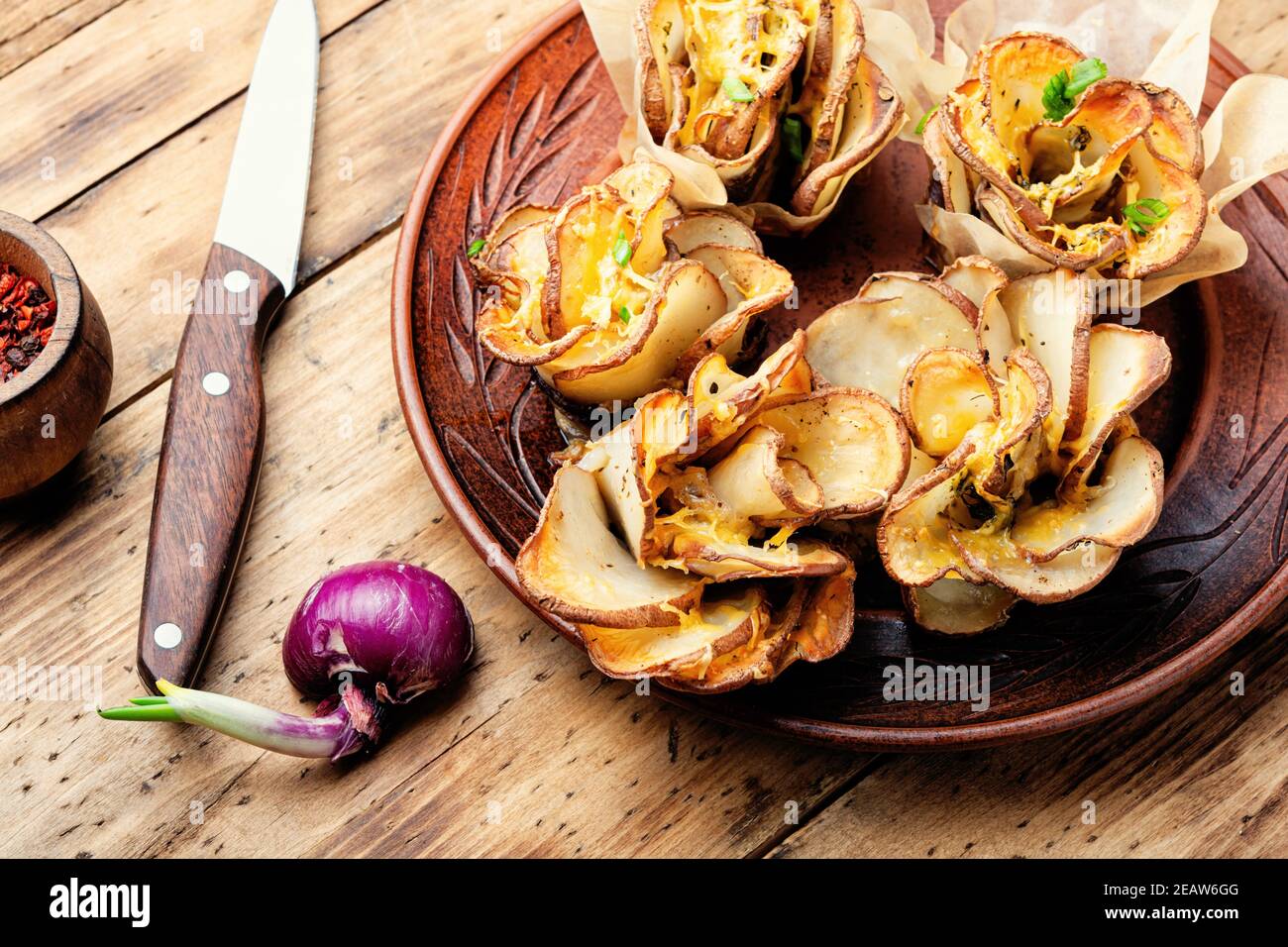 Baked potatoes in bacon Stock Photo - Alamy