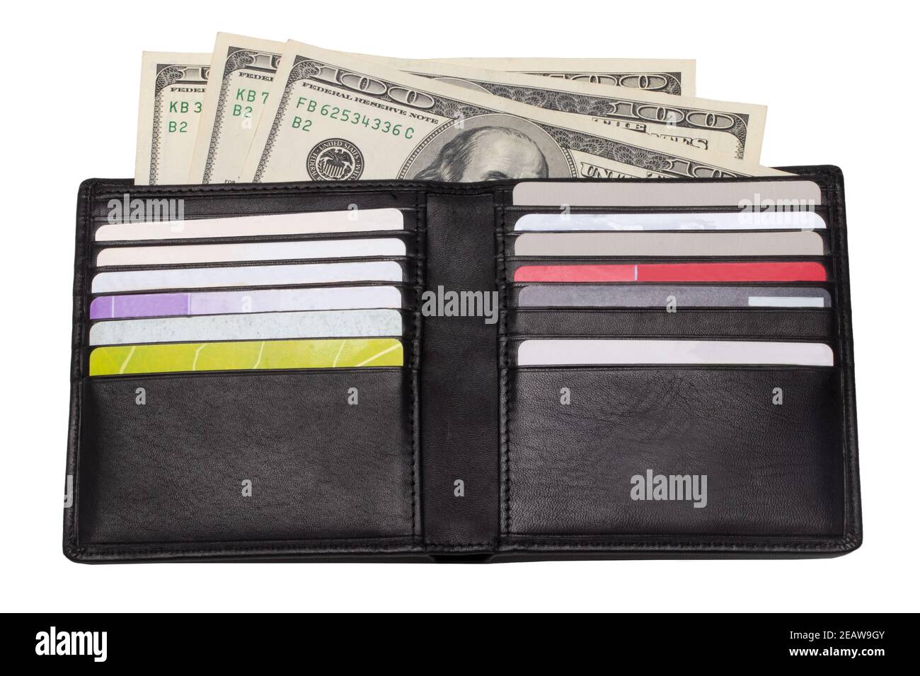Closeup of a open new black genuine leather wallet with US dollars banknotes and various plastic cards isolated on a white background. Financial and business concept. Stock Photo