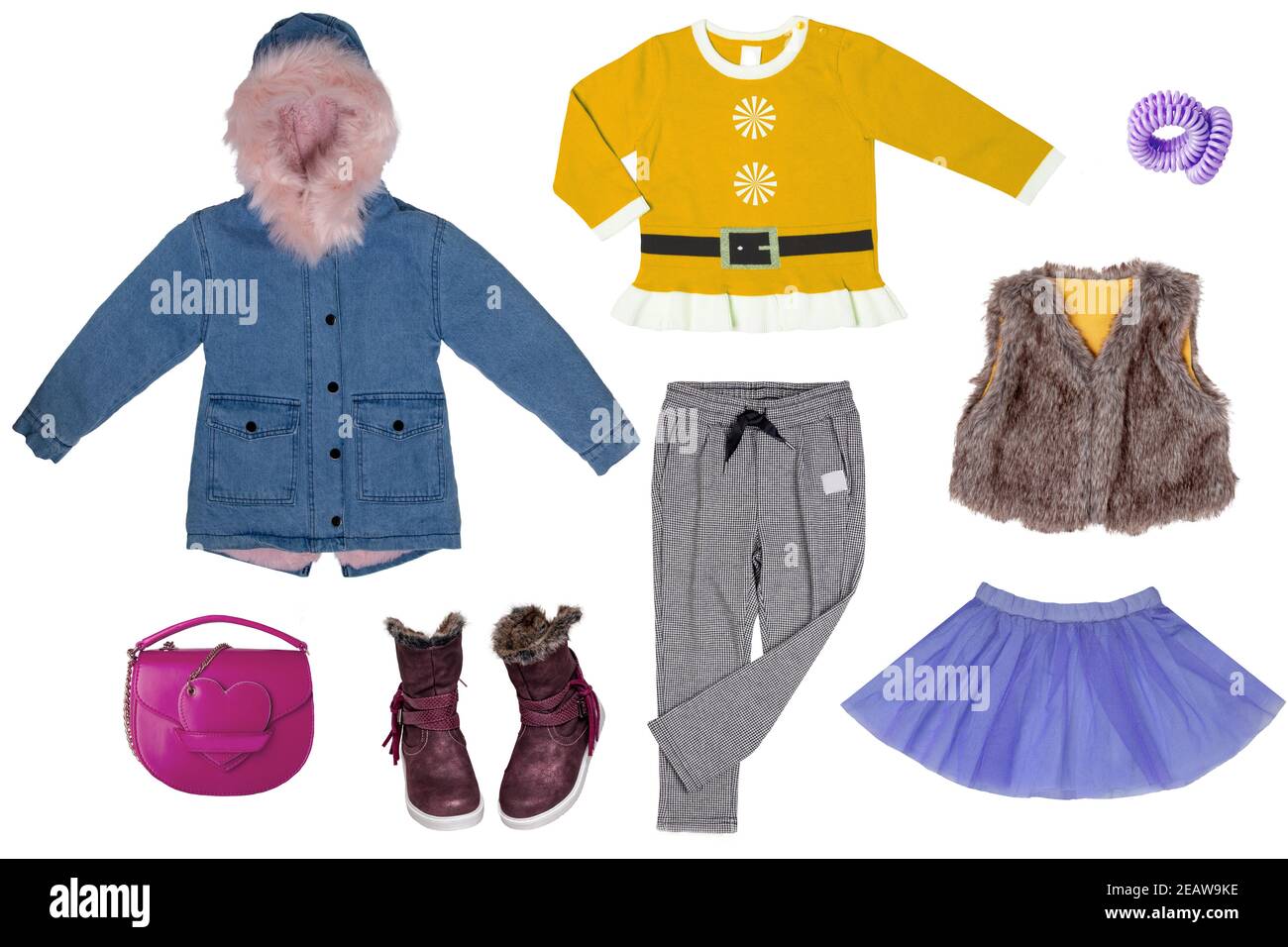 Collage set of little girl winter clothes isolated on a white background. The collection of a jeans jacket, a sweat pants, shoes, a sweater, a vest, a skirt and a handbag. Kids spring and autumn fashion. Stock Photo