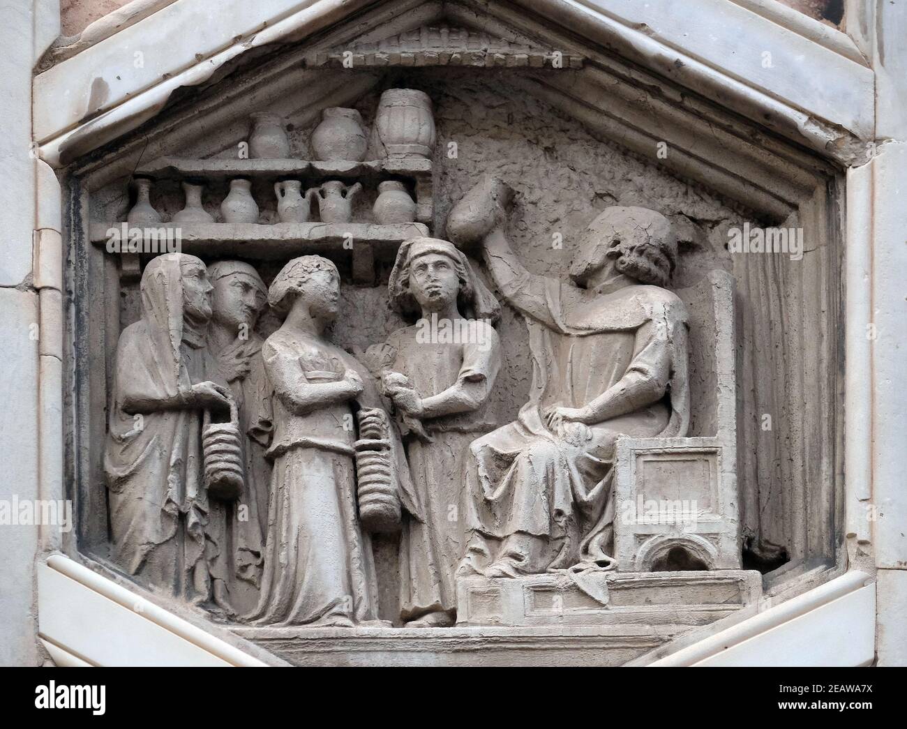 Allegory of medicine from the workshop of Andrea Pisano, Relief on Giotto Campanile of Cattedrale di Santa Maria del Fiore (Cathedral of Saint Mary of the Flower), Florence, Italy Stock Photo