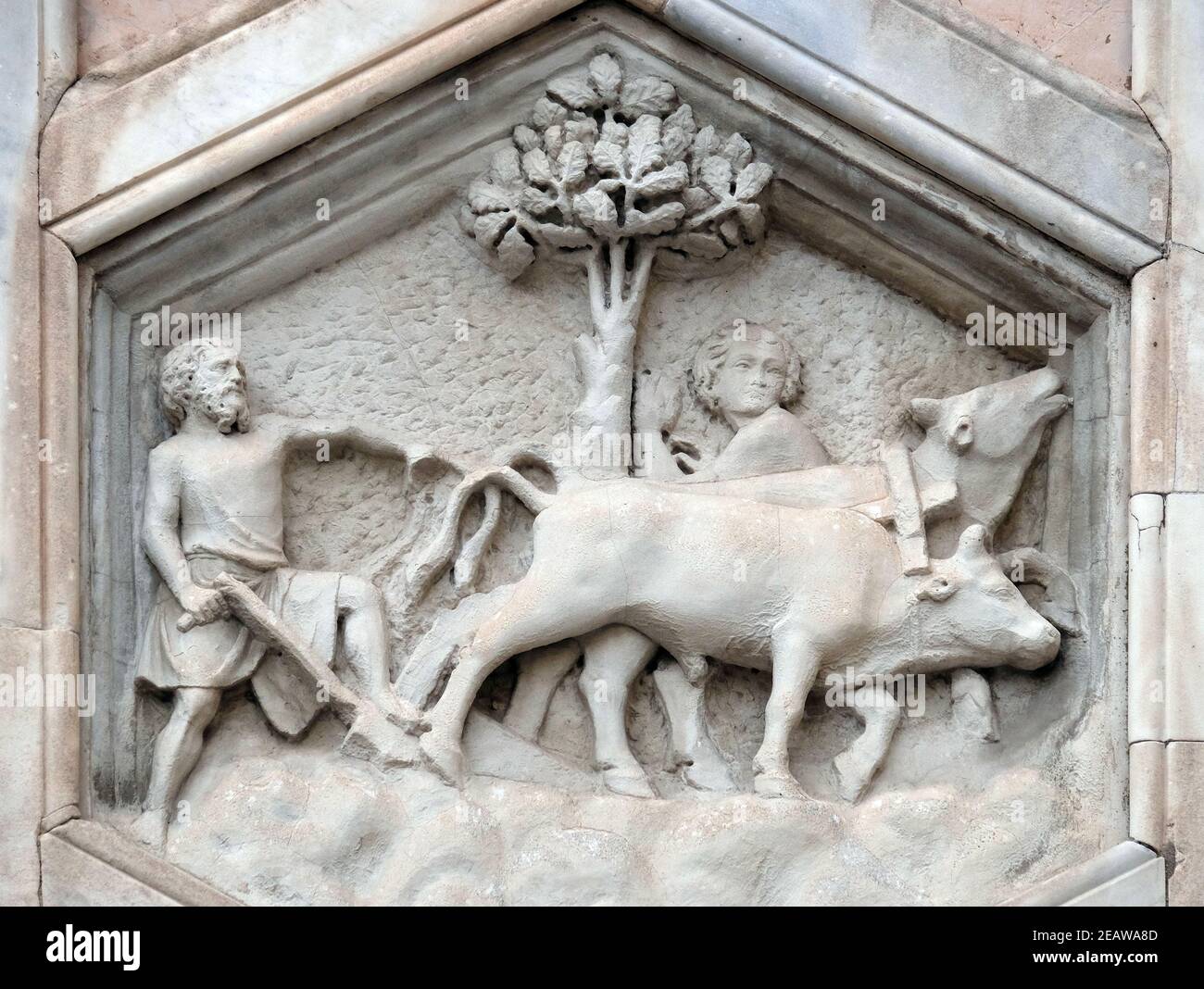 Agriculture from the workshop of Andrea Pisano, Relief on Giotto Campanile of Cattedrale di Santa Maria del Fiore (Cathedral of Saint Mary of the Flower), Florence, Italy Stock Photo