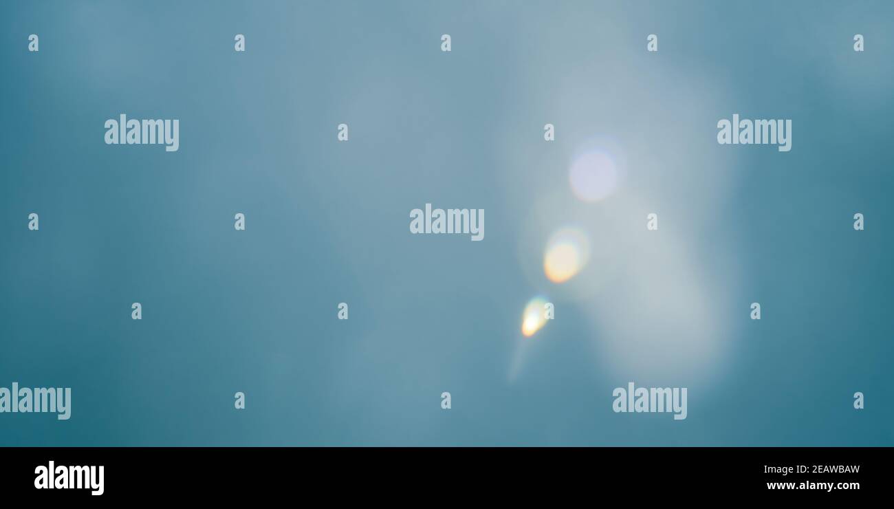 Abstract blue background with lens flare Stock Photo