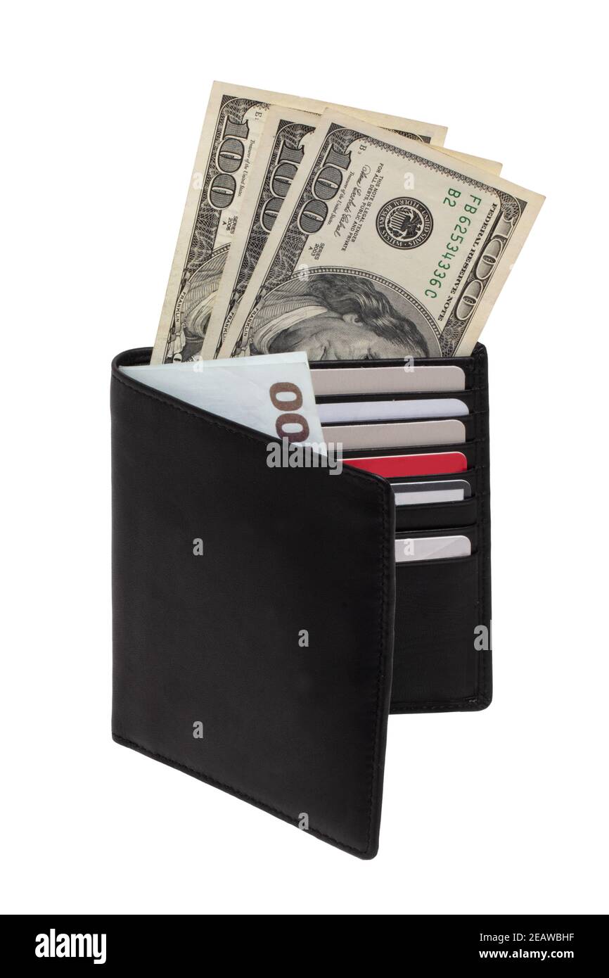 Closeup of a open new black leather wallet with US dollars and a 100 euro banknotes and various plastic cards  isolated on a white background. Financial and business concept. Stock Photo