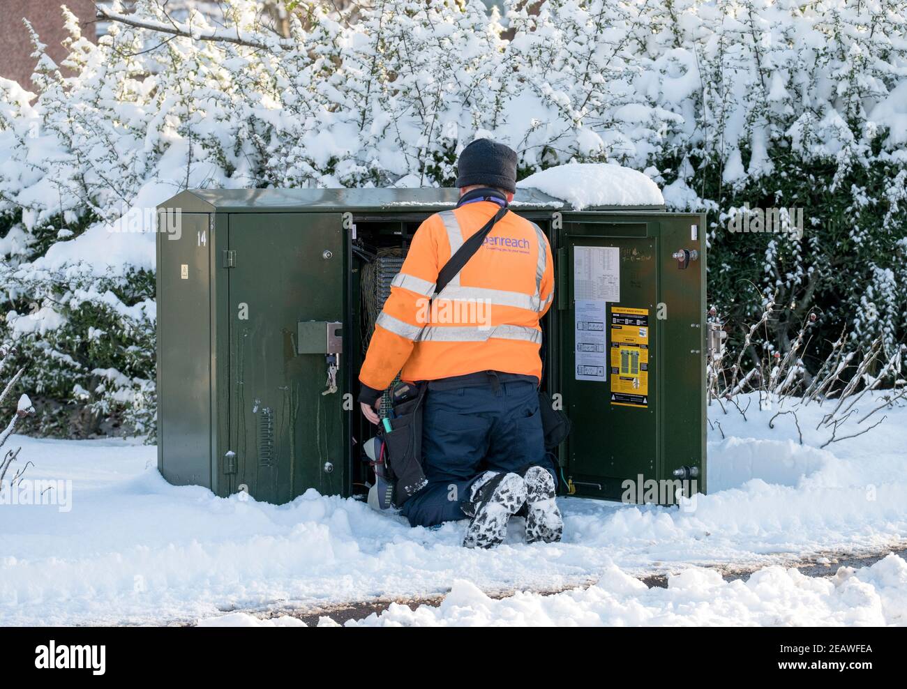 BT Openreach engineer working on a superfast broadband telephone exchange near Livingston West Lothian. Stock Photo