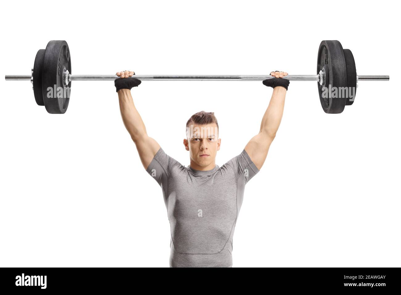 Muscular guy lifting weights isolated on white background Stock Photo