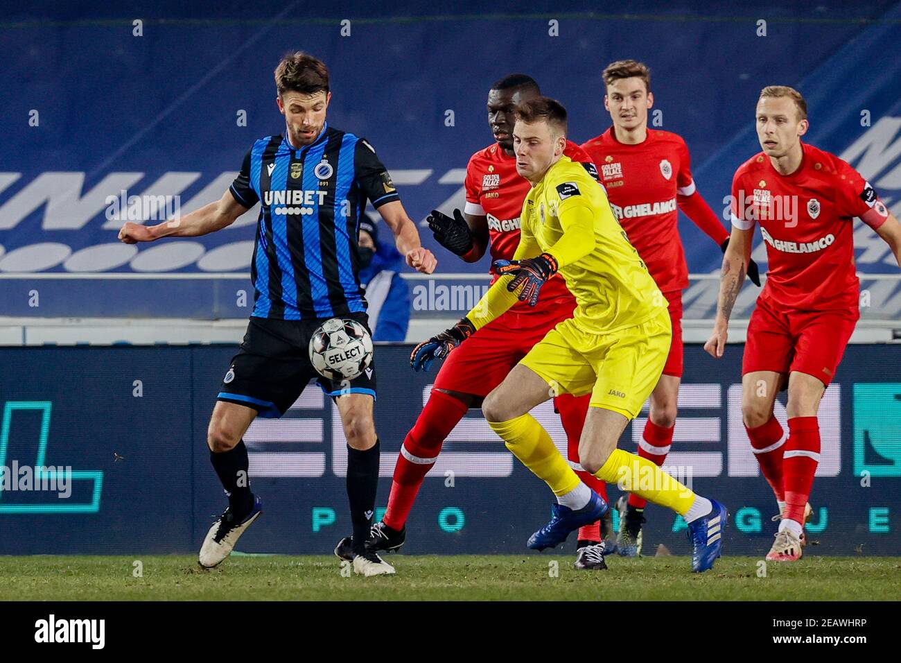 Club's Brandon Mechele and Antwerp's goalkeeper Ortwin De Wolf fight