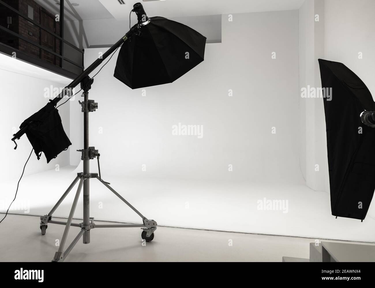 White photo studio interior background, cyclorama structure and professional impulse lights Stock Photo