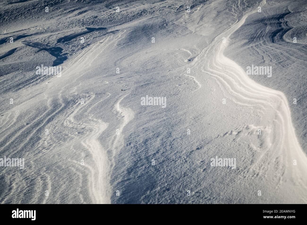 Patterns of a snowdrift in winter in the Canadian Arctic, Northwest Territories. Stock Photo