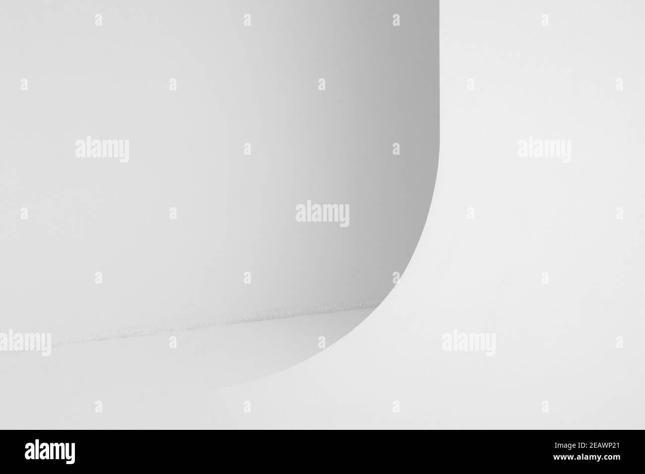 Abstract blank white photo studio interior background, cyclorama structure with a smooth transition between horizontal and vertical planes Stock Photo