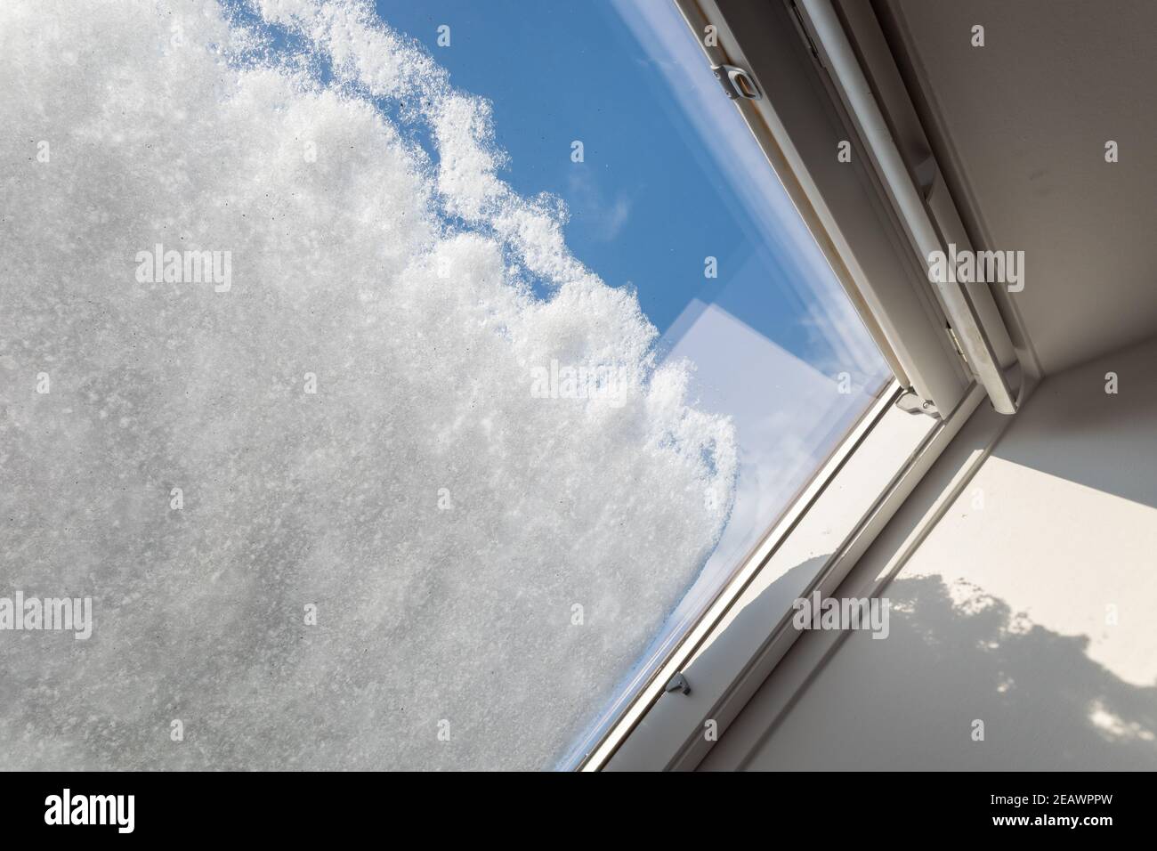 Selective focus and interior view through skylight with thick layer of