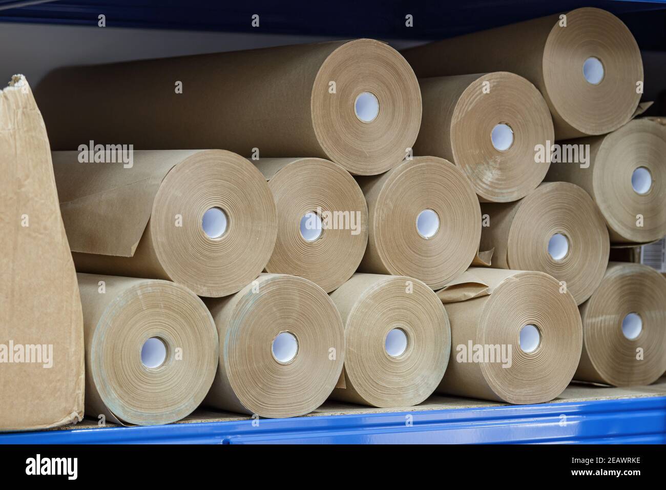 Craft paper rolls folded on a shelf in a warehouse Stock Photo Alamy
