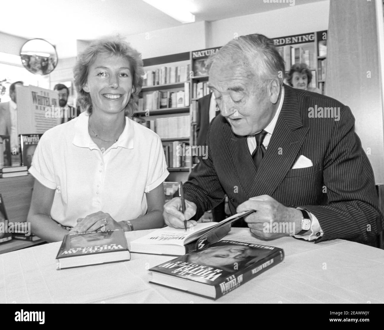 HEMEL HEMPSTEAD - ENGLAND. Willie Whitelaw signs his book ’The Whitelaw Memories’ at WH Smiths in Hemel Hempstead, Hertfordshire, England in1989. Phot Stock Photo