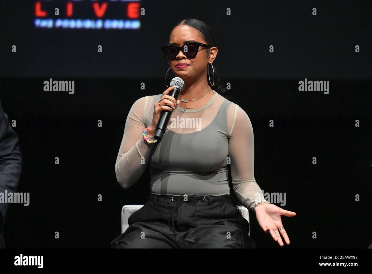 H.E.R. speaks onstage during Global Citizen Presents Global Goal Live: The Possible Dream at St. Ann’s Warehouse on September 26, 2019 in New York. Stock Photo