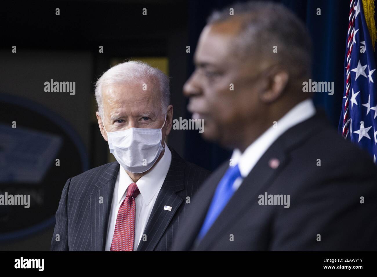 Arlington, United States. 10th Feb, 2021. President Joe Biden (L) listens to Secretary of Defense Lloyd Austin deliver remarks to Department of Defense personnel at the Pentagon in Arlington, Virginia, on Wednesday February 10, 2021. Photo by Michael Reynolds/UPI Credit: UPI/Alamy Live News Stock Photo
