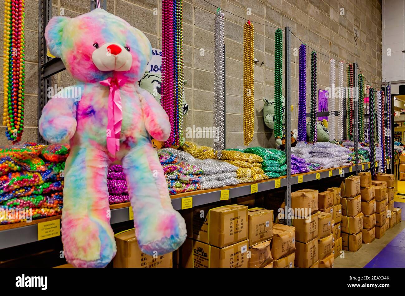 Mardi Gras beads and other throws such as stuffed animals line the
